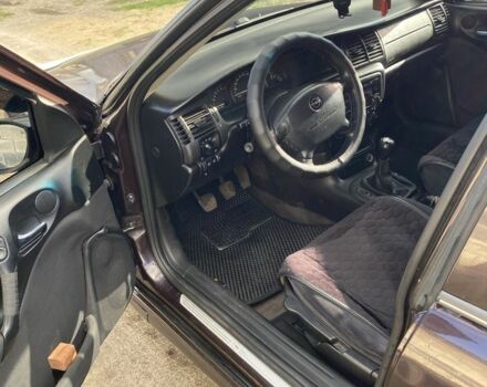 Красный Опель Вектра, объемом двигателя 1.6 л и пробегом 210 тыс. км за 2900 $, фото 3 на Automoto.ua