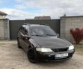 Красный Опель Вектра, объемом двигателя 1.6 л и пробегом 290 тыс. км за 2193 $, фото 1 на Automoto.ua