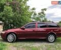 Красный Опель Вектра, объемом двигателя 2.2 л и пробегом 290 тыс. км за 3200 $, фото 1 на Automoto.ua