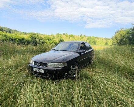 Червоний Опель Вектра, об'ємом двигуна 1 л та пробігом 370 тис. км за 2500 $, фото 1 на Automoto.ua