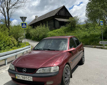 Красный Опель Вектра, объемом двигателя 2 л и пробегом 460 тыс. км за 2000 $, фото 1 на Automoto.ua