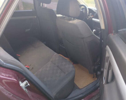 Красный Опель Вектра, объемом двигателя 2.2 л и пробегом 290 тыс. км за 2750 $, фото 6 на Automoto.ua