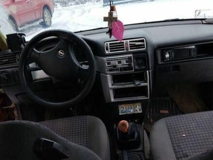 Красный Опель Вектра, объемом двигателя 2 л и пробегом 260 тыс. км за 1600 $, фото 1 на Automoto.ua