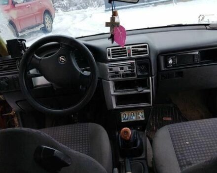 Красный Опель Вектра, объемом двигателя 2 л и пробегом 260 тыс. км за 1600 $, фото 1 на Automoto.ua