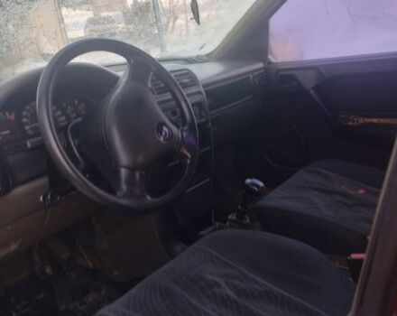 Красный Опель Вектра, объемом двигателя 1.4 л и пробегом 400 тыс. км за 850 $, фото 1 на Automoto.ua