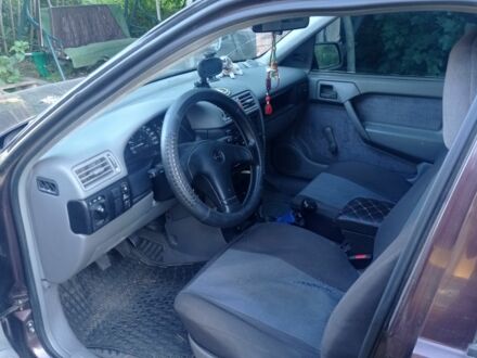 Красный Опель Вектра, объемом двигателя 2 л и пробегом 350 тыс. км за 1400 $, фото 1 на Automoto.ua