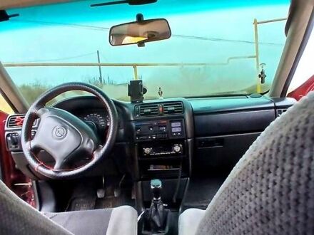Опель Вектра 1995 в Коростене на Automoto.ua Красный Опель Вектра, объемом двигателя 2 л и пробегом 318 тыс. км за 2300 $, фото 1 на Automoto.ua