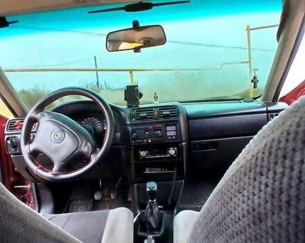 Красный Опель Вектра, объемом двигателя 2 л и пробегом 318 тыс. км за 2200 $, фото 1 на Automoto.ua