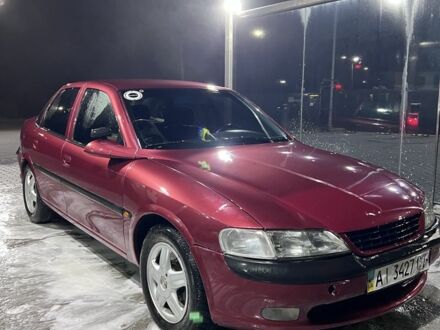 Червоний Опель Вектра, об'ємом двигуна 2 л та пробігом 267 тис. км за 2500 $, фото 1 на Automoto.ua