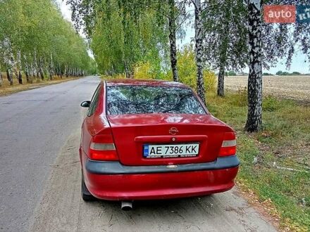 Красный Опель Вектра, объемом двигателя 1.8 л и пробегом 347 тыс. км за 1699 $, фото 1 на Automoto.ua