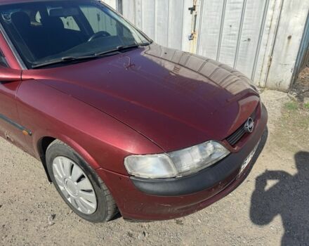 Красный Опель Вектра, объемом двигателя 1.6 л и пробегом 348 тыс. км за 1250 $, фото 1 на Automoto.ua