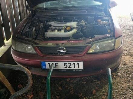 Красный Опель Вектра, объемом двигателя 0 л и пробегом 300 тыс. км за 308 $, фото 1 на Automoto.ua