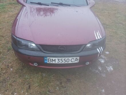 Красный Опель Вектра, объемом двигателя 1.7 л и пробегом 400 тыс. км за 2300 $, фото 1 на Automoto.ua