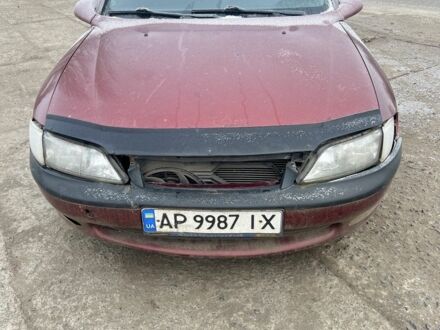 Красный Опель Вектра, объемом двигателя 2.5 л и пробегом 300 тыс. км за 2364 $, фото 1 на Automoto.ua