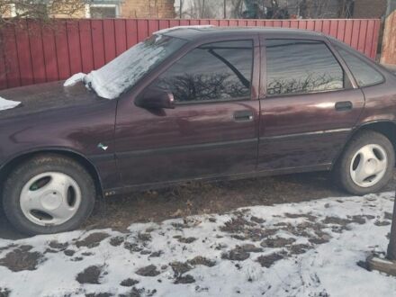 Красный Опель Вектра, объемом двигателя 8 л и пробегом 200 тыс. км за 878 $, фото 1 на Automoto.ua