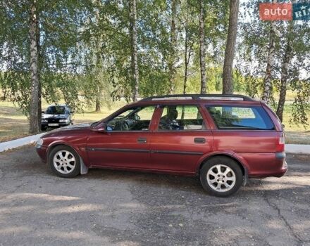 Красный Опель Вектра, объемом двигателя 1.8 л и пробегом 396 тыс. км за 1698 $, фото 1 на Automoto.ua