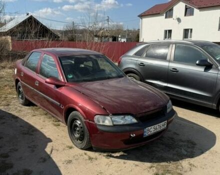 Красный Опель Вектра, объемом двигателя 1.8 л и пробегом 250 тыс. км за 999 $, фото 1 на Automoto.ua