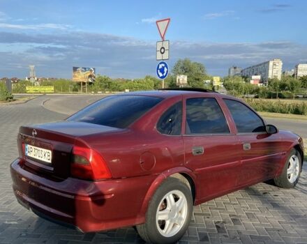 Красный Опель Вектра, объемом двигателя 1.6 л и пробегом 400 тыс. км за 2400 $, фото 1 на Automoto.ua