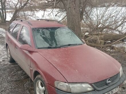 Червоний Опель Вектра, об'ємом двигуна 2 л та пробігом 220 тис. км за 1800 $, фото 1 на Automoto.ua