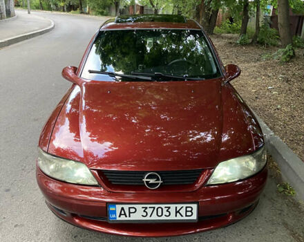 Красный Опель Вектра, объемом двигателя 1.6 л и пробегом 400 тыс. км за 2300 $, фото 1 на Automoto.ua
