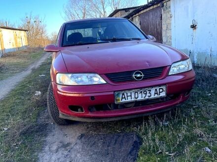 Красный Опель Вектра, объемом двигателя 1.8 л и пробегом 420 тыс. км за 1250 $, фото 1 на Automoto.ua