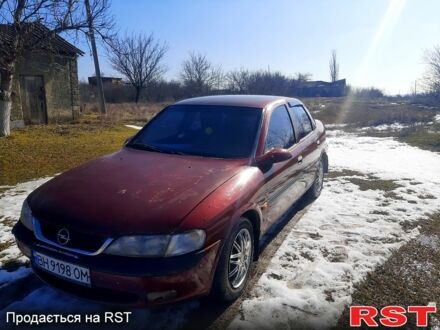 Червоний Опель Вектра, об'ємом двигуна 2 л та пробігом 340 тис. км за 1500 $, фото 1 на Automoto.ua