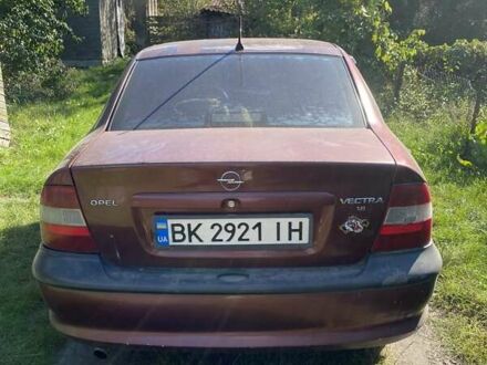Красный Опель Вектра, объемом двигателя 1.8 л и пробегом 327 тыс. км за 1200 $, фото 1 на Automoto.ua