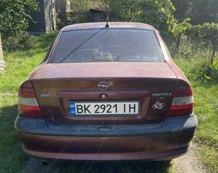 Красный Опель Вектра, объемом двигателя 1.8 л и пробегом 327 тыс. км за 1200 $, фото 1 на Automoto.ua