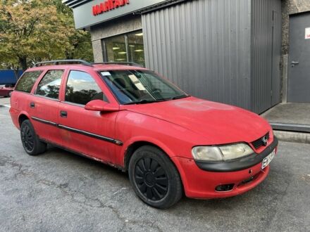 Красный Опель Вектра, объемом двигателя 2 л и пробегом 250 тыс. км за 1000 $, фото 1 на Automoto.ua