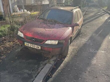 Красный Опель Вектра, объемом двигателя 0 л и пробегом 100 тыс. км за 600 $, фото 1 на Automoto.ua