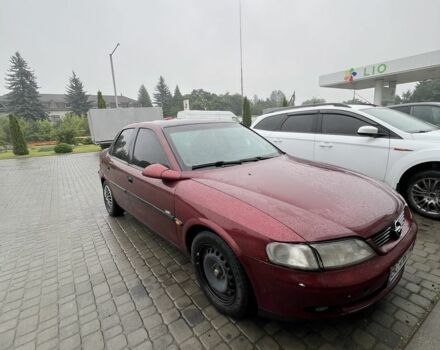 Красный Опель Вектра, объемом двигателя 1.8 л и пробегом 295 тыс. км за 1900 $, фото 1 на Automoto.ua