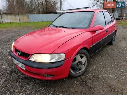 Красный Опель Вектра, объемом двигателя 1.6 л и пробегом 409 тыс. км за 1250 $, фото 1 на Automoto.ua