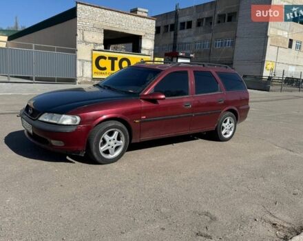Красный Опель Вектра, объемом двигателя 2 л и пробегом 200 тыс. км за 1600 $, фото 1 на Automoto.ua