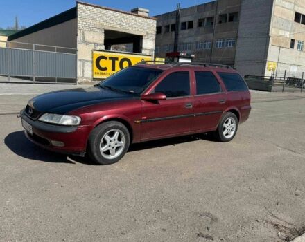 Красный Опель Вектра, объемом двигателя 2 л и пробегом 200 тыс. км за 1600 $, фото 1 на Automoto.ua
