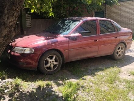 Красный Опель Вектра, объемом двигателя 1.8 л и пробегом 270 тыс. км за 2786 $, фото 1 на Automoto.ua
