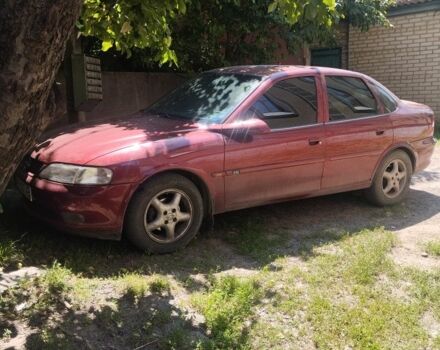 Красный Опель Вектра, объемом двигателя 1.8 л и пробегом 270 тыс. км за 2786 $, фото 1 на Automoto.ua