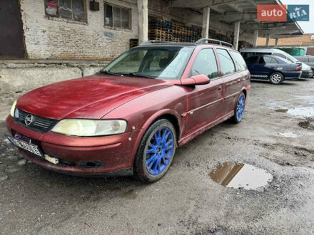 Красный Опель Вектра, объемом двигателя 2 л и пробегом 300 тыс. км за 850 $, фото 1 на Automoto.ua