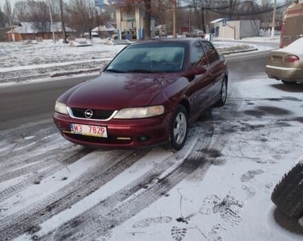 Красный Опель Вектра, объемом двигателя 2 л и пробегом 235 тыс. км за 1539 $, фото 1 на Automoto.ua