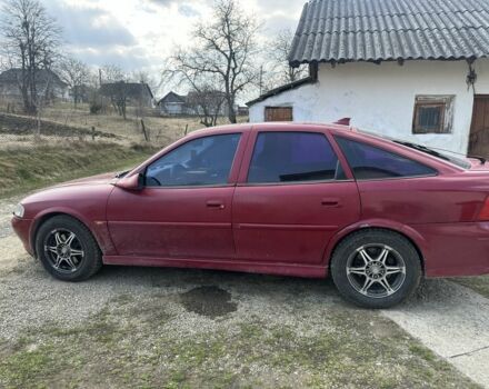 Красный Опель Вектра, объемом двигателя 2 л и пробегом 388 тыс. км за 1800 $, фото 1 на Automoto.ua