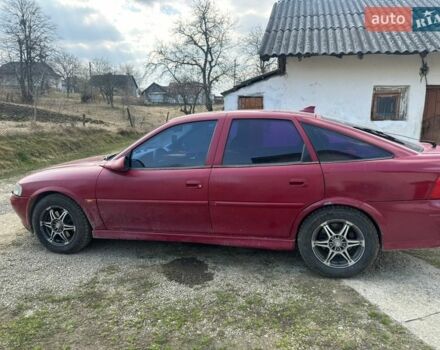 Красный Опель Вектра, объемом двигателя 2 л и пробегом 388 тыс. км за 1800 $, фото 1 на Automoto.ua