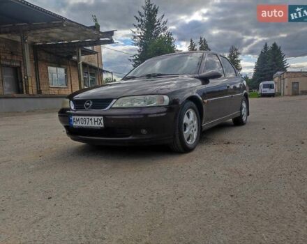 Красный Опель Вектра, объемом двигателя 1.8 л и пробегом 247 тыс. км за 3800 $, фото 1 на Automoto.ua