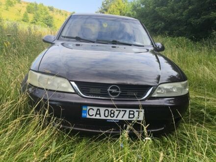 Красный Опель Вектра, объемом двигателя 1 л и пробегом 370 тыс. км за 2500 $, фото 1 на Automoto.ua