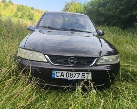 Красный Опель Вектра, объемом двигателя 1 л и пробегом 370 тыс. км за 2500 $, фото 1 на Automoto.ua