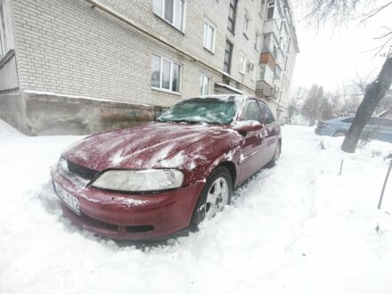 Красный Опель Вектра, объемом двигателя 1.9 л и пробегом 295 тыс. км за 1150 $, фото 1 на Automoto.ua