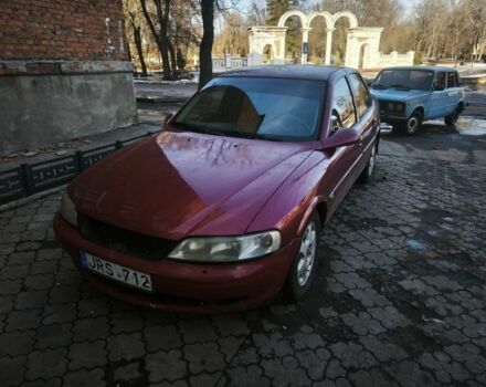 Красный Опель Вектра, объемом двигателя 2 л и пробегом 275 тыс. км за 950 $, фото 1 на Automoto.ua