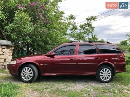Красный Опель Вектра, объемом двигателя 2.2 л и пробегом 290 тыс. км за 3200 $, фото 1 на Automoto.ua