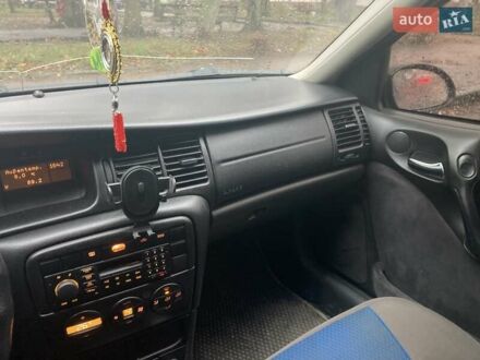 Красный Опель Вектра, объемом двигателя 2 л и пробегом 396 тыс. км за 2500 $, фото 1 на Automoto.ua