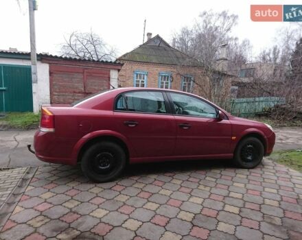 Красный Опель Вектра, объемом двигателя 2.2 л и пробегом 236 тыс. км за 5900 $, фото 1 на Automoto.ua