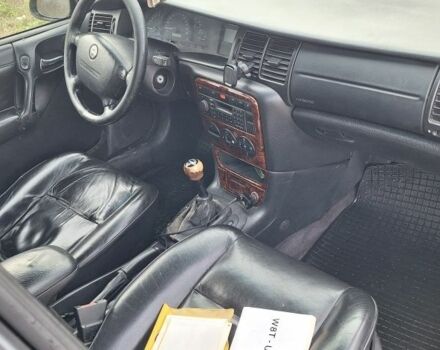 Серый Опель Вектра, объемом двигателя 2 л и пробегом 280 тыс. км за 1850 $, фото 4 на Automoto.ua