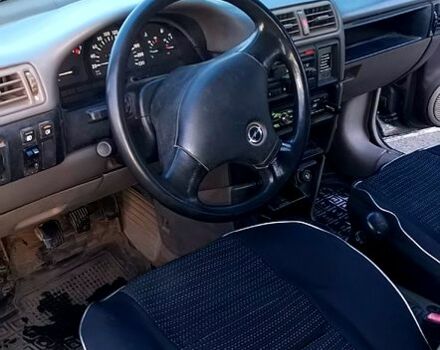 Серый Опель Вектра, объемом двигателя 2 л и пробегом 335 тыс. км за 1950 $, фото 3 на Automoto.ua